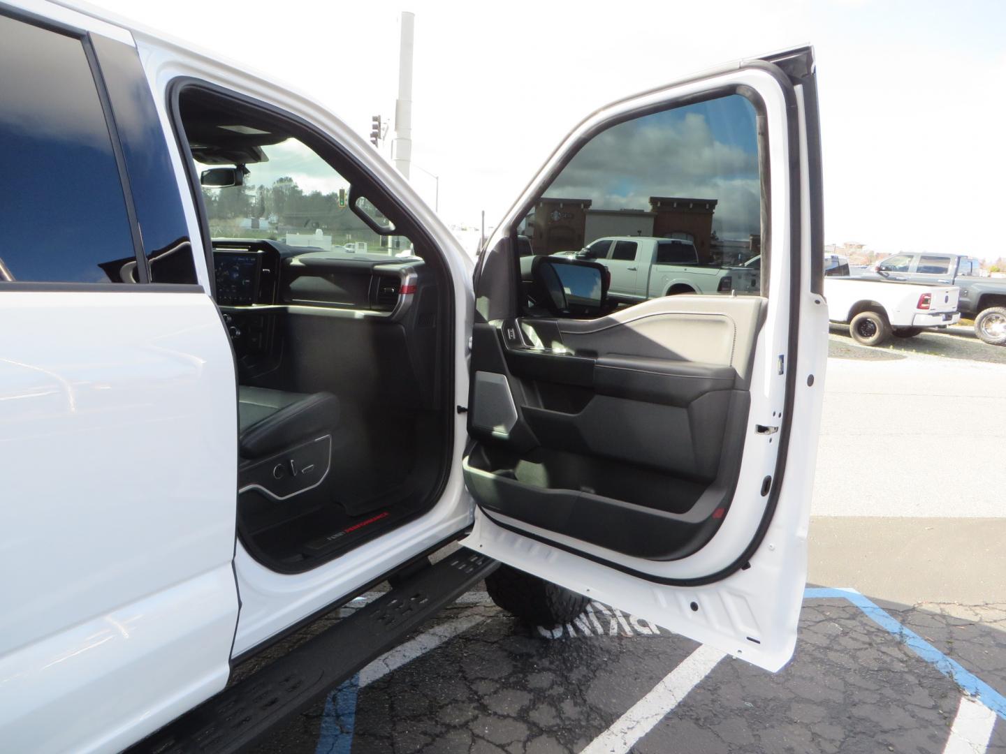 2023 White /BLACK Ford F-150 Raptor SuperCrew 4WD (1FTFW1RG6PF) with an 3.5 V6 engine, 6A transmission, located at 2630 Grass Valley Highway, Auburn, CA, 95603, (530) 508-5100, 38.937893, -121.095482 - Raptor sitting on Eibach front and rear springs, 37" Nitto Ridge Grappler tires, 17" Method NV wheels, and window tint. - Photo#45